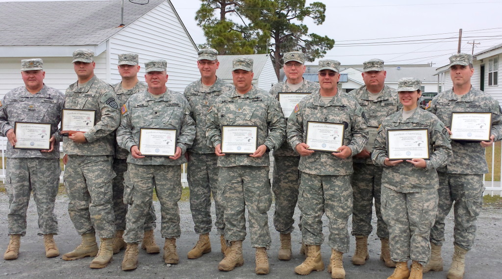 Left to Right: MAJ Don Lankford, PFC Jon Van Holm, SGT Christopher Lowry, SPC Thomas Willis, 2LT Jimmie Turner, 2LT Ted Burzynski, SGT Richard Wiggs, MSG Steve Scruggs, WO1 Todd Stansell, SSG Cindy Dunlap, PV2 Stephen Patterson. (Not Pictured: CPT Vadim Timchenko, PV2 Lonnie Curley)